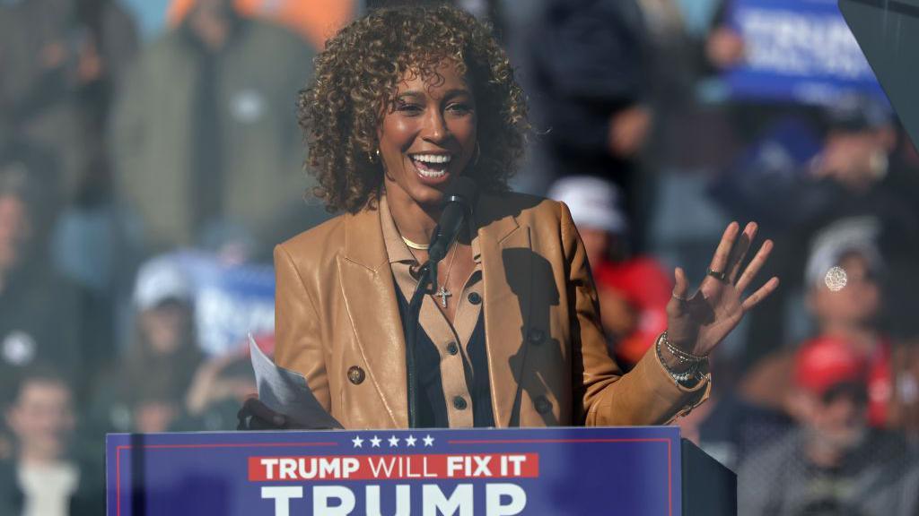Television anchor Sage Steele takes the stage during a Republican presidential nominee, former U.S. President Donald Trump campaign rally at Lancaster Airport on November 03, 2024 in Lititz, Pennsylvania. 