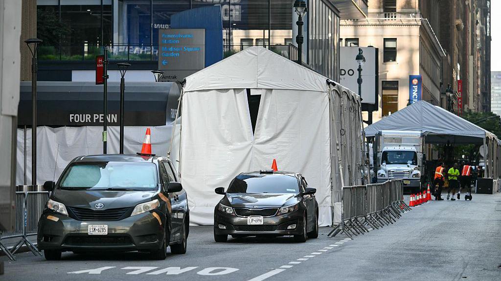 Multiple tented entrances are seen outside Madison Square Garden