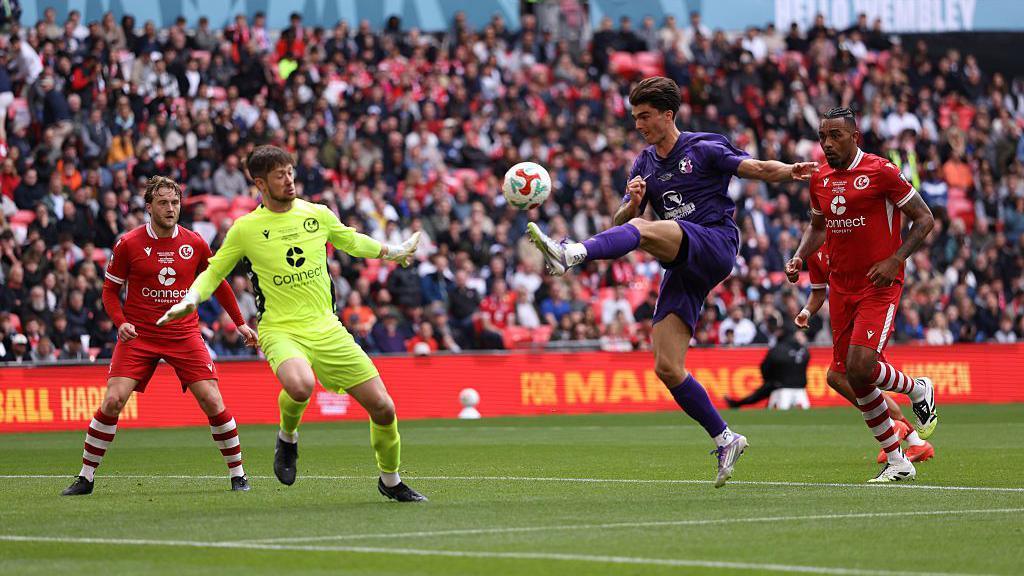 AFC Stoneham and Cockfosters FC in action during the FA Vase final