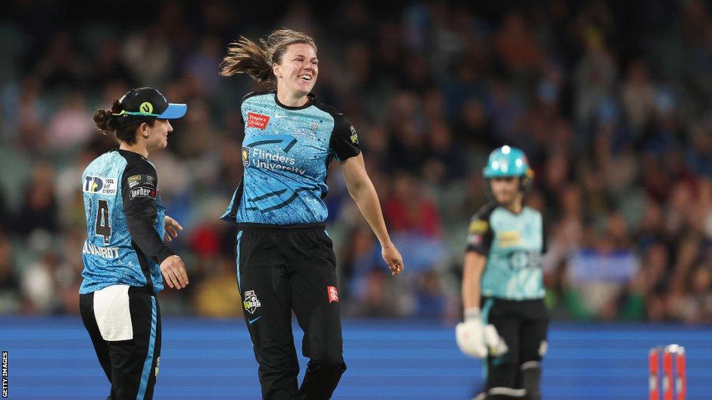 Tahlia McGrath of the Adelaide Strikers celebrates bowling Laura Harris of the Brisbane Heat for a duck with Laura Wolvaardt of the Adelaide Strikers during the WBBL Final match between Adelaide Strikers and Brisbane Heat at Adelaide Oval