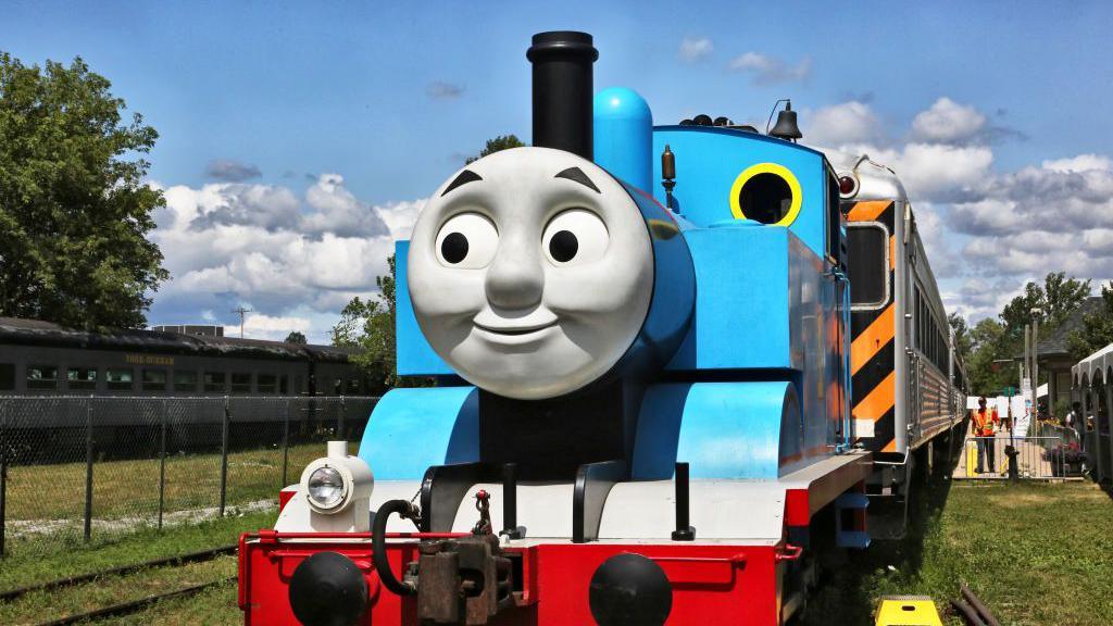 A full scale model of the Thomas the Tank Engine. It is a blue train with an animate face on the front.