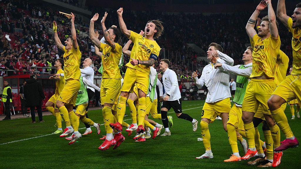 Bodo/Glimt players celebrating their win after the match.