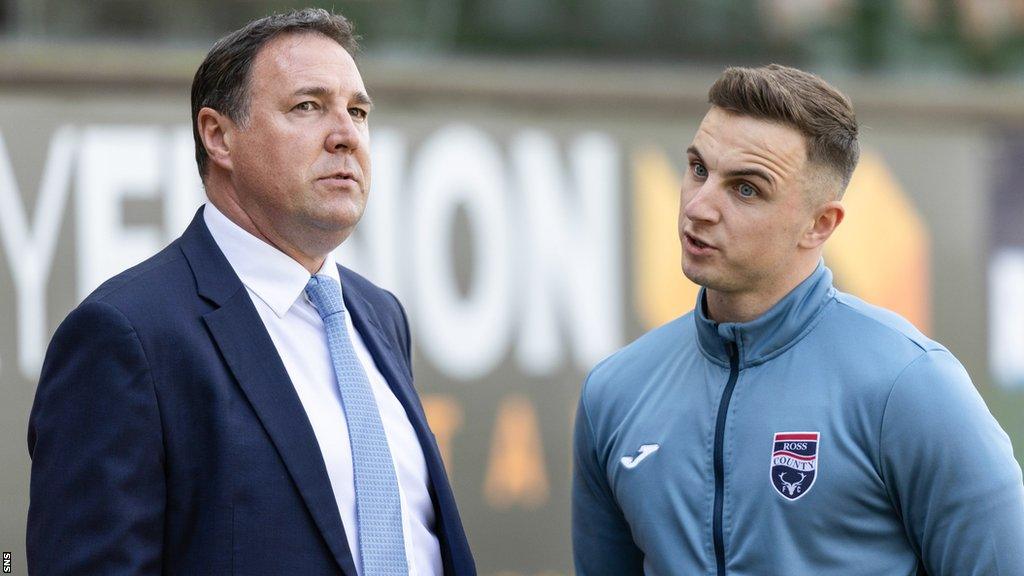 Ross County manager Malky Mackay and Eamonn Brophy