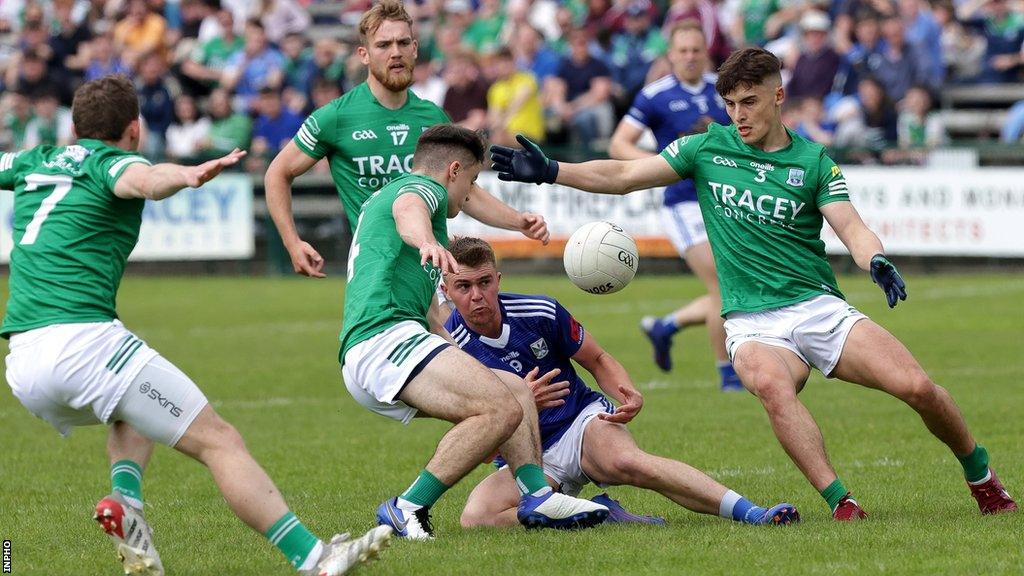 Cavan's Cian Madden battles with Fermanagh's Jonny Cassidy and Luke Flanagan in last year's Tailteann Cup quarter-final