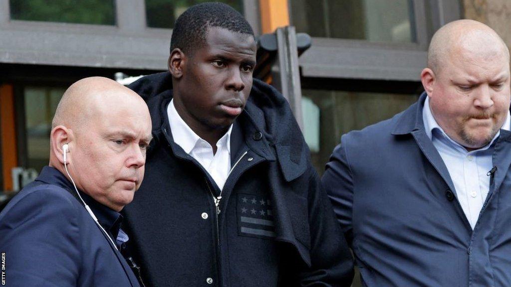 Kurt Zouma (centre) leaving Thames Magistrates' Court