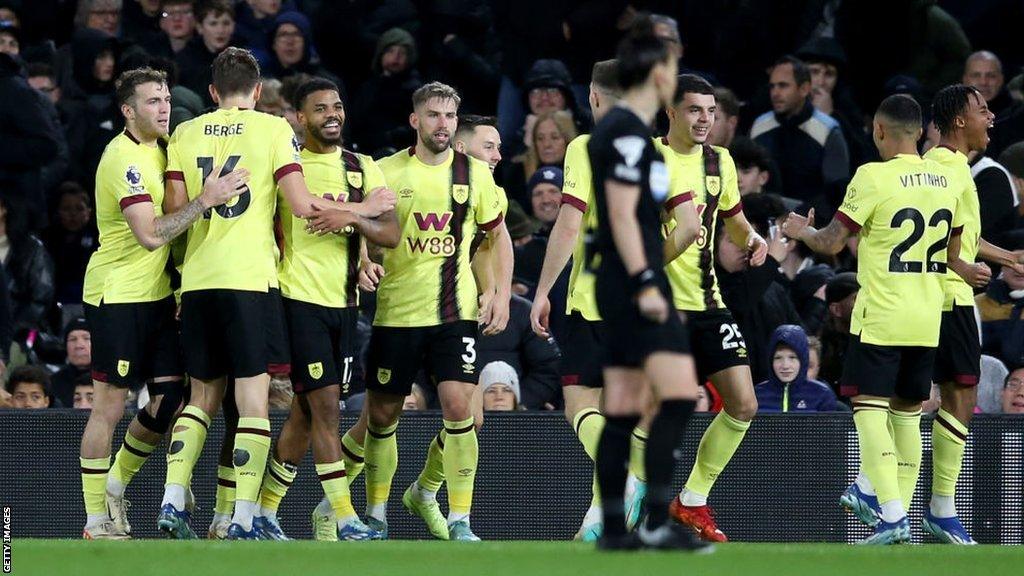 Burnley's players celebrate after Wilson Odobert's opening goal for the Clarets against Fulham