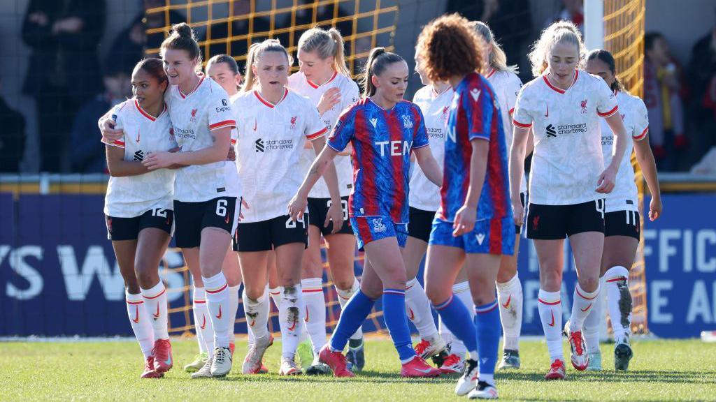 Liverpool celebrate scoring against Crystal Palace in the WSL on Sunday.