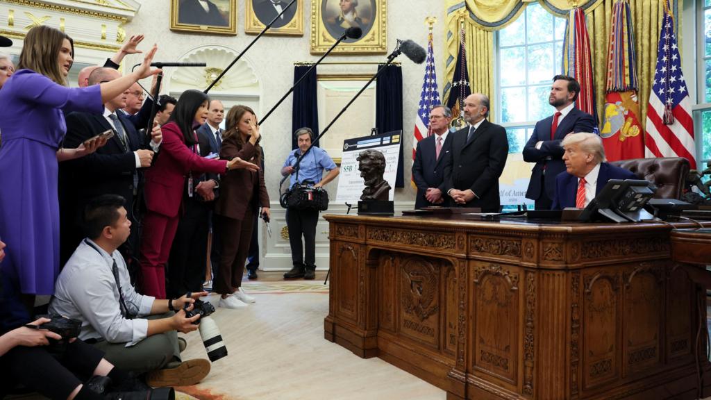 Donald Trump speaking to journalists in the Oval Office