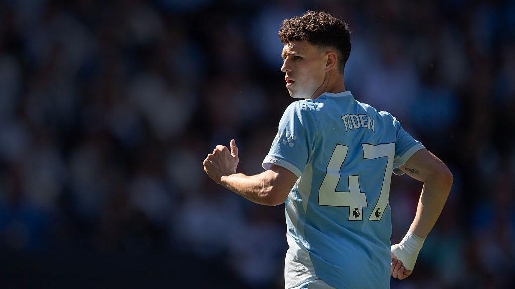 Phil Foden in action for Manchester City