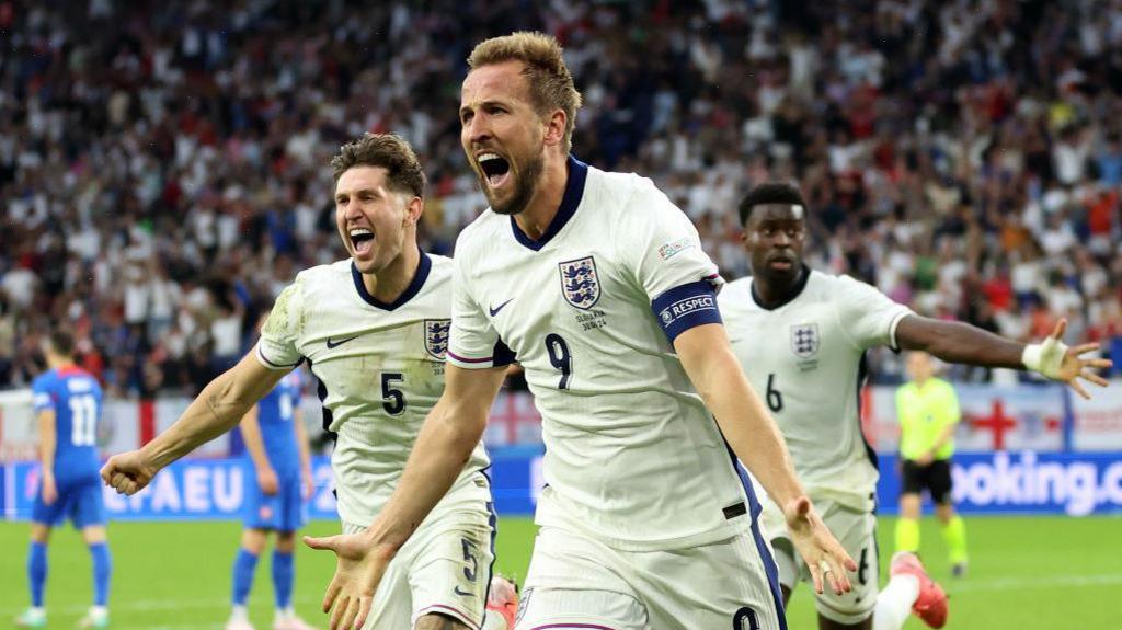 Harry Kane of England celebrates scoring his team's second goal.