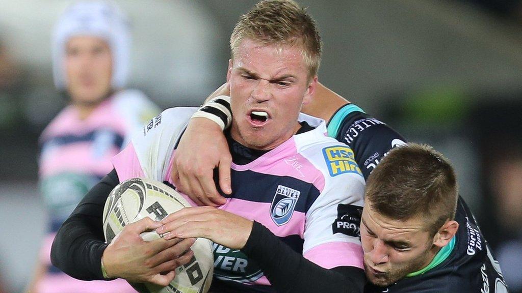 Cardiff Blues Gareth Anscombe is tackled by Dan Lydiate of Ospreys