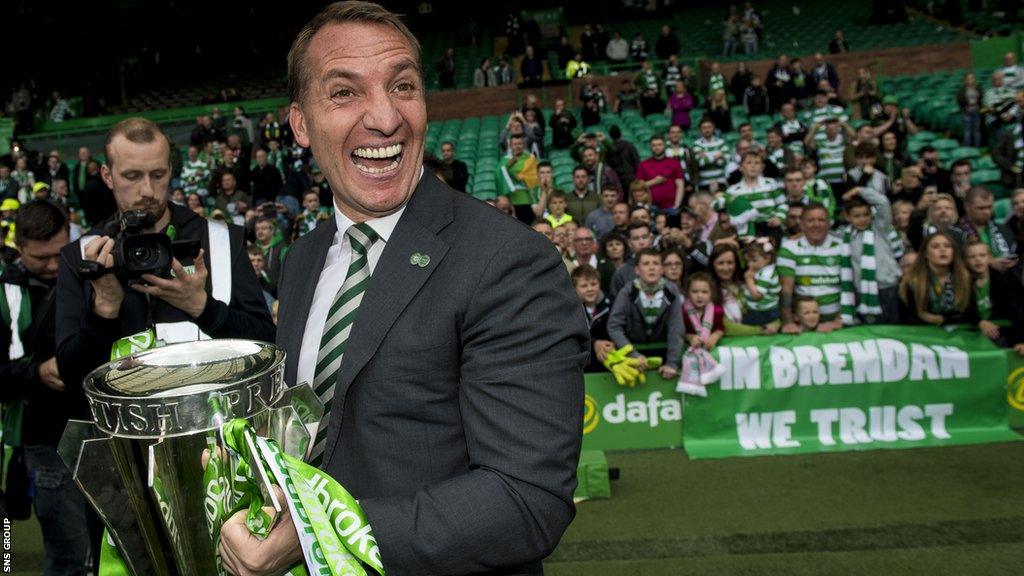 Brendan Rodgers holds the Scottish Premiership trophy