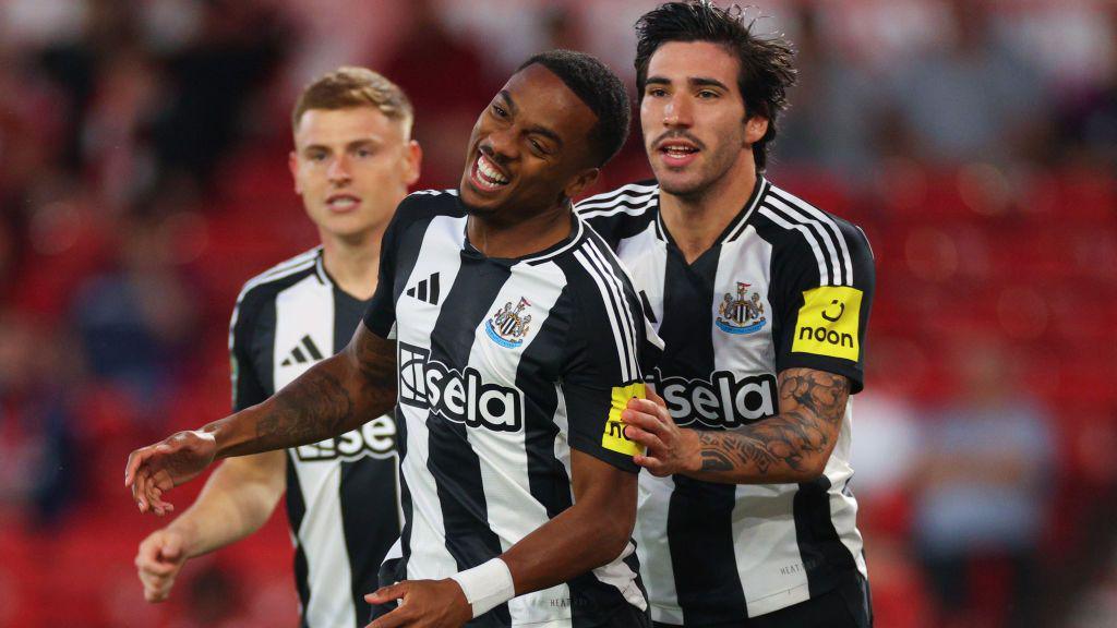 Newcastle players celebrate