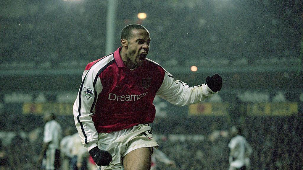 Thierry Henry celebrates scoring for Arsenal in the Premier League