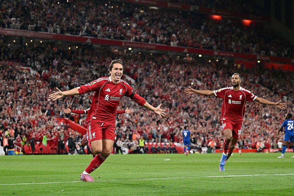 Liverpool's Federico Chiesa celebrates scoring against Bournemouth with team-mate Cody Gakpo at Anfield in the Premier League in August 2025