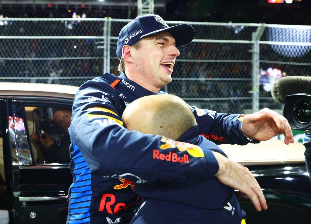 Max Verstappen celebrates his world title with race engineer Gianpiero Lambiase