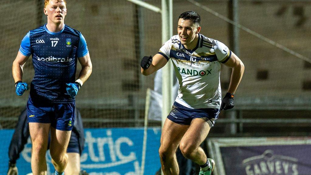 Ben McCarron celebrates scoring Ulster's third goal against UCD