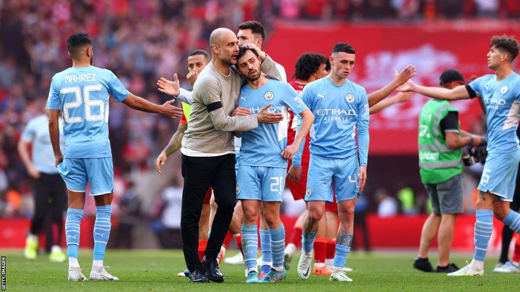Manchester City players look dejected after a semi-final defeat to Liverpool