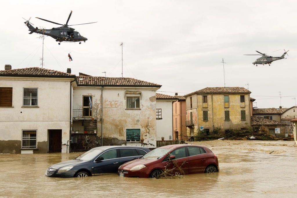 cars in flood waters with helicopters above