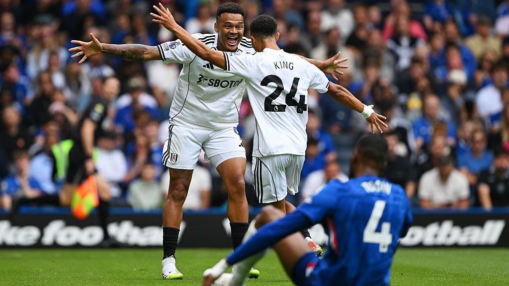 Josh King of Fulham celebrates scoring his teams goal which team-mate Rodrigo Muniz 