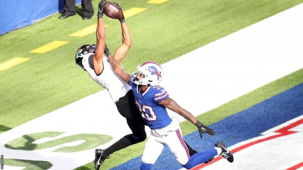 Zay Jones scores a touchdown for the Jacksonville Jaguars against the Buffalo Bills at Tottenham Hotspur Stadium