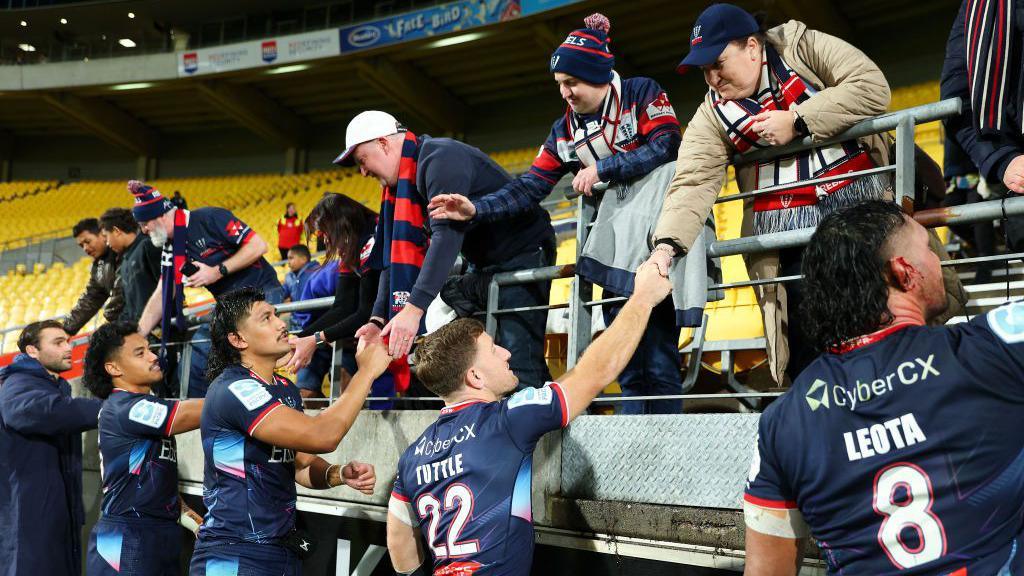 Melbourne Rebels players thank fans after their final match in June 2024