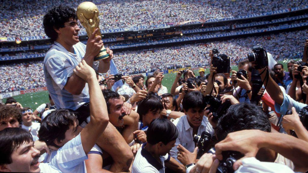 Maradona celebrates with World Cup 1986