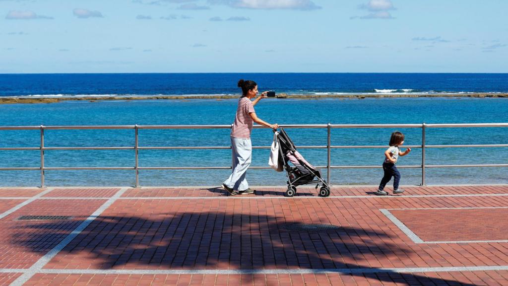 Mother and child on promenade, Gran Canaria, Spain