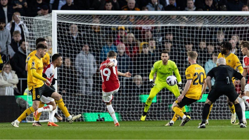 Leandro Trossard scores a goal against Wolves