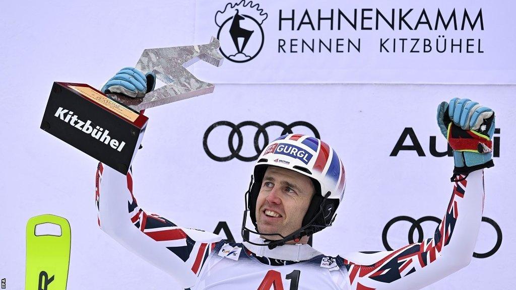 Dave Ryding celebrates on the podium after finishing second at the World Cup slalom in Kitzbuhel in January