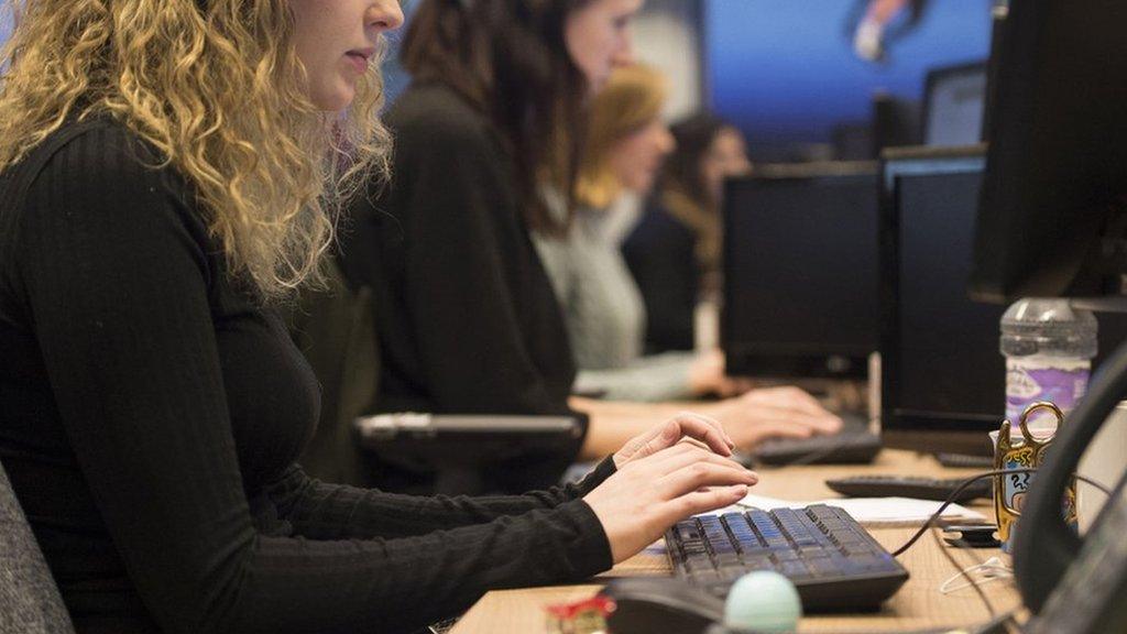 Workers at desks