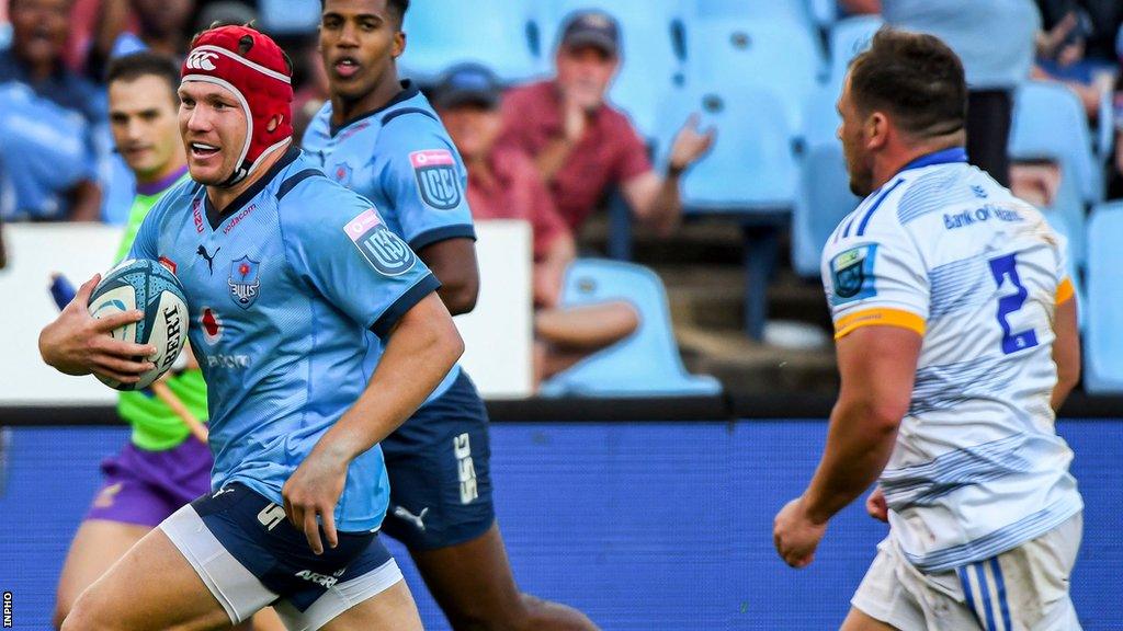 Johan Grobbelaar runs in for one of his two tries for Bulls