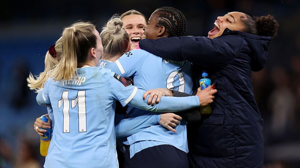 Manchester City players celebrate
