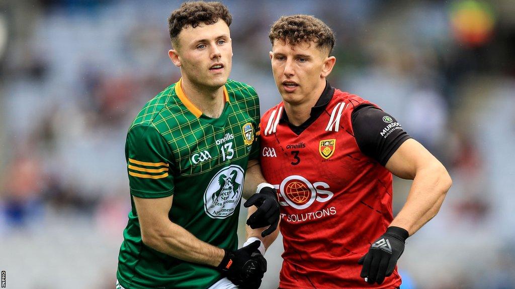 Meath's Jordan Morris and Down's Pierce Laverty tussle during the Tailteann Cup final in July