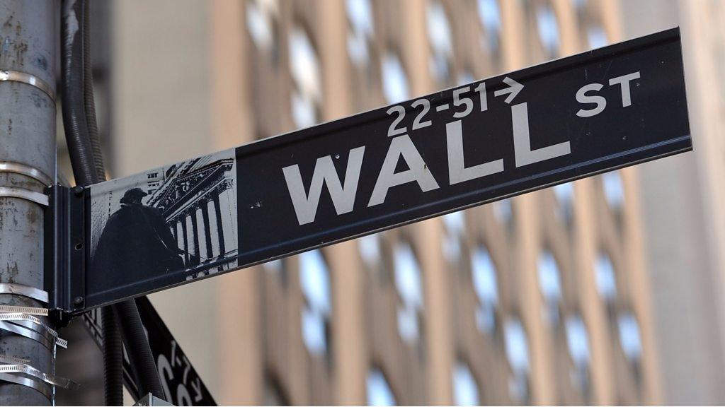 A Wall Street sign