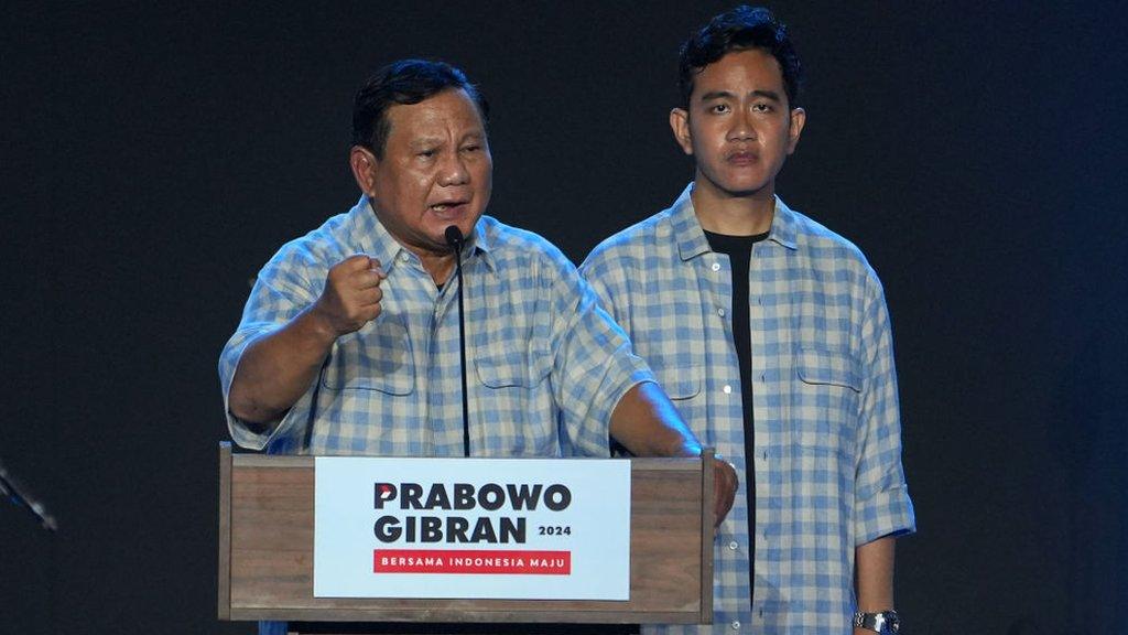 Indonesia leader sworn in with largest cabinet in decades