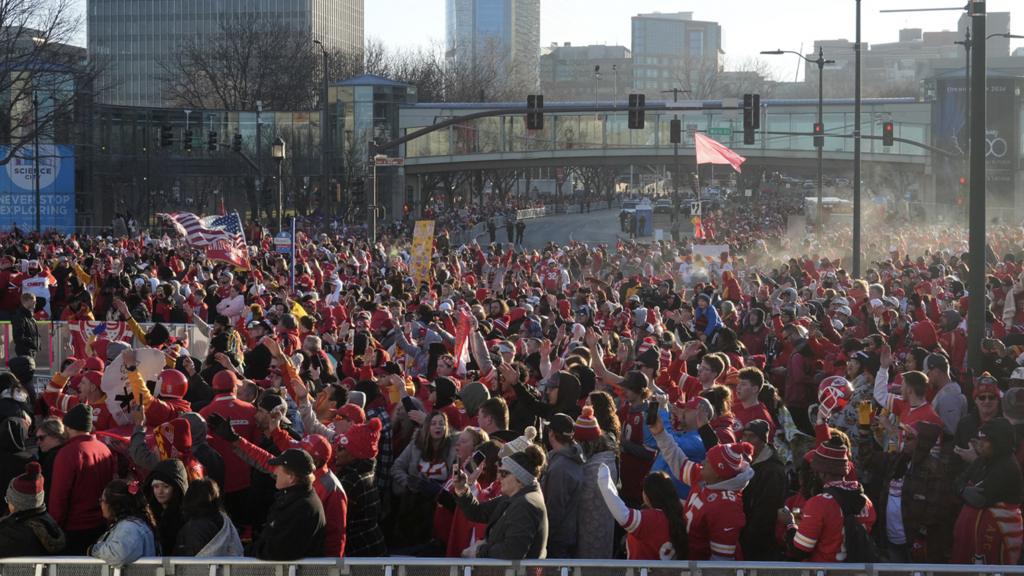 General view of signage and large crowd before the parade to celebrate of the Kansas City Chiefs winning Super Bowl LVIII on 14 February