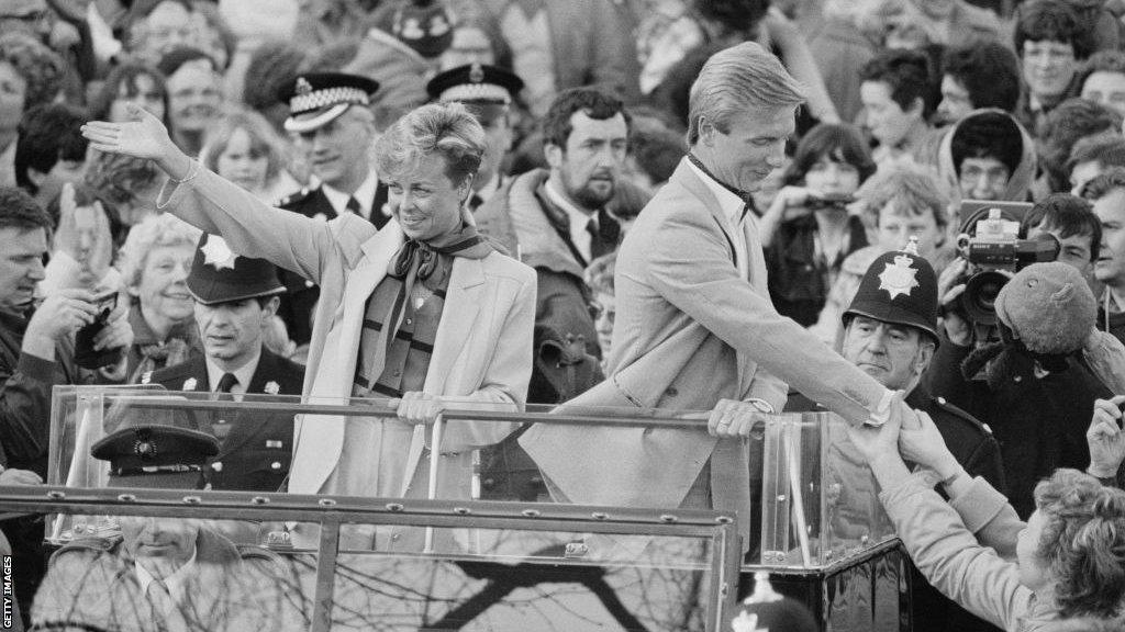 Jayne Torvill and Christopher Dean greet fans on their return to the UK from the 1984 Olympics