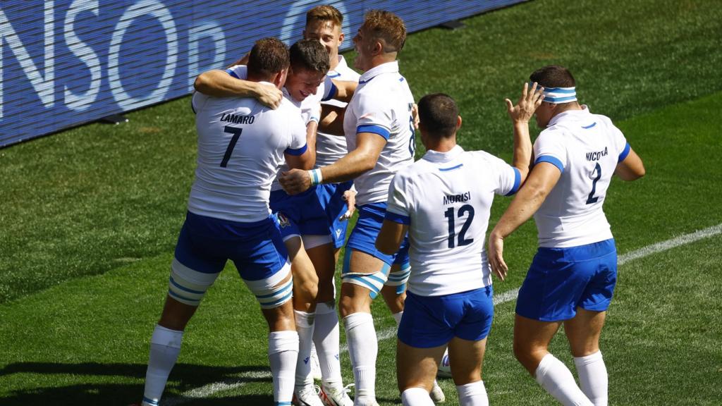 Italy celebrate a try against Namibia