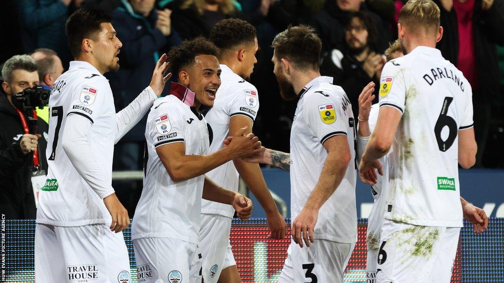 Swansea players celebrate Matty Sorinola's goal against Blackpool in midweek, when Russell Martin's side claimed a first victory in four league games