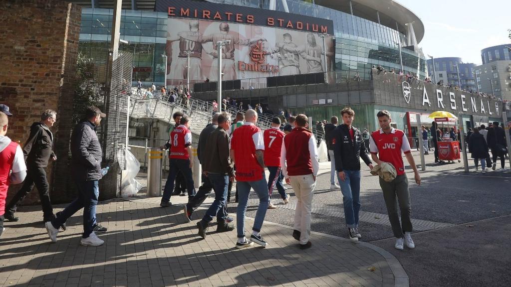 Fans arrive at the Emirates Stadium