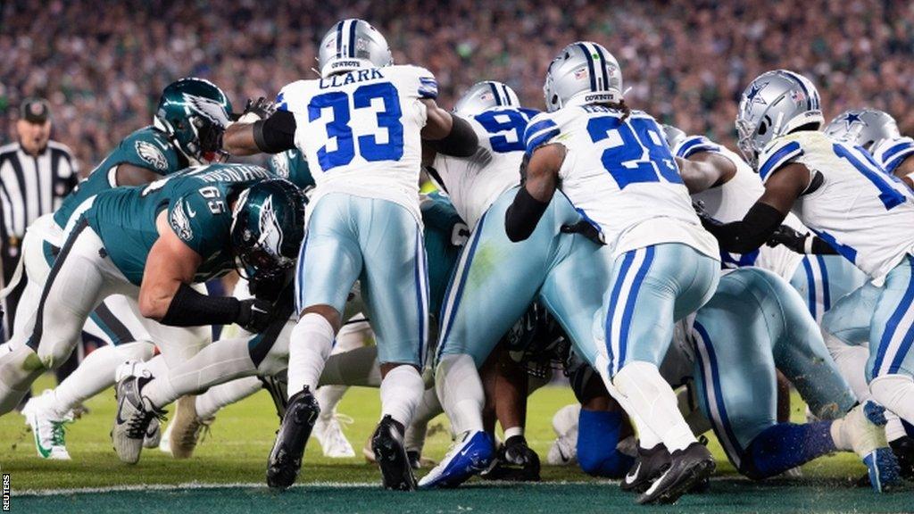 Jalen Hurts forces in a touchdown against the Dallas Cowboys