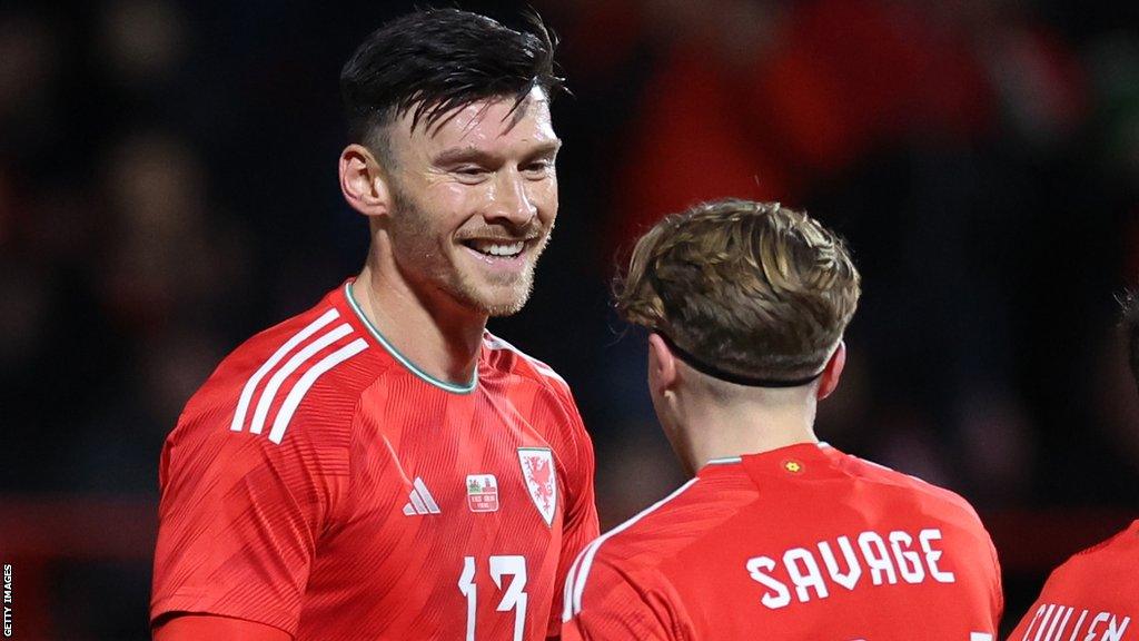 Kieffer Moore celebrates with new team-mate Charlie Savage