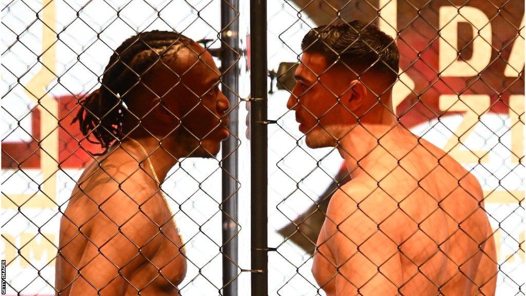 KSI and Tommy Fury face off in a cage