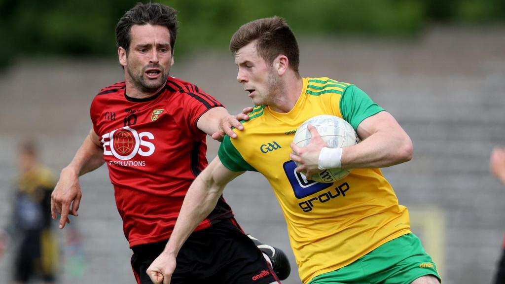 Down's Kevin McKernan and Donegal's Eoghan Ban Gallagher battle in the 2018 Ulster Football semi-final