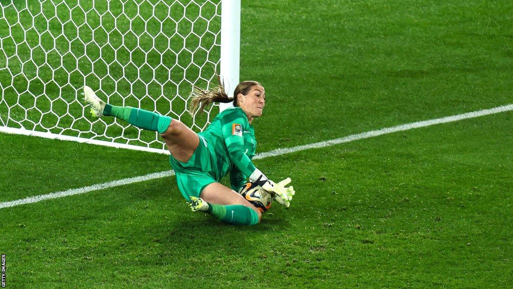 Mary Earps saves a penalty in the World Cup final against Spain