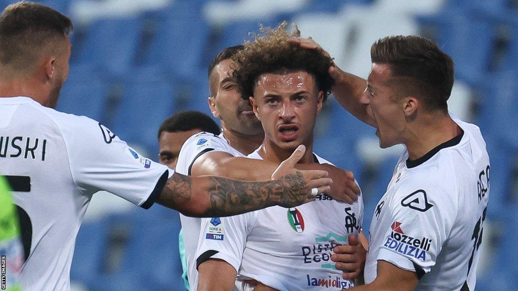 Ethan Ampadu is congratulated by team-mates after scoring for Spezia