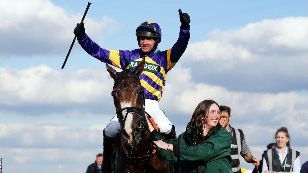 Derek Fox celebrates after Corach Rambler's win in the Grand National