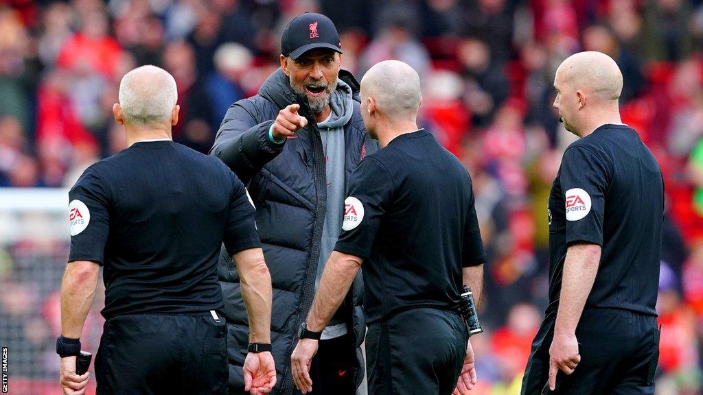 Liverpool manager Jurgen Klopp speaks to the match officials at the end of Sunday's win over Tottenham