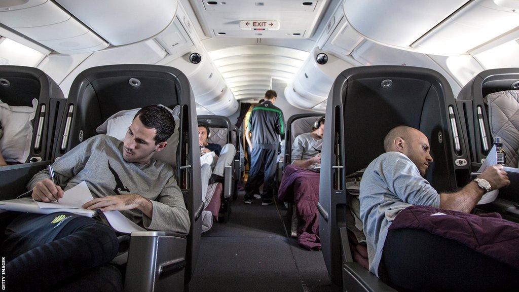 Ryan McGowan (left) on a flight to Brazil for the 2014 World Cup